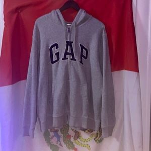 This is a silver XL gap zip up hoodie.